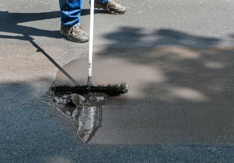 Asphalt Sealcoating in Progress
